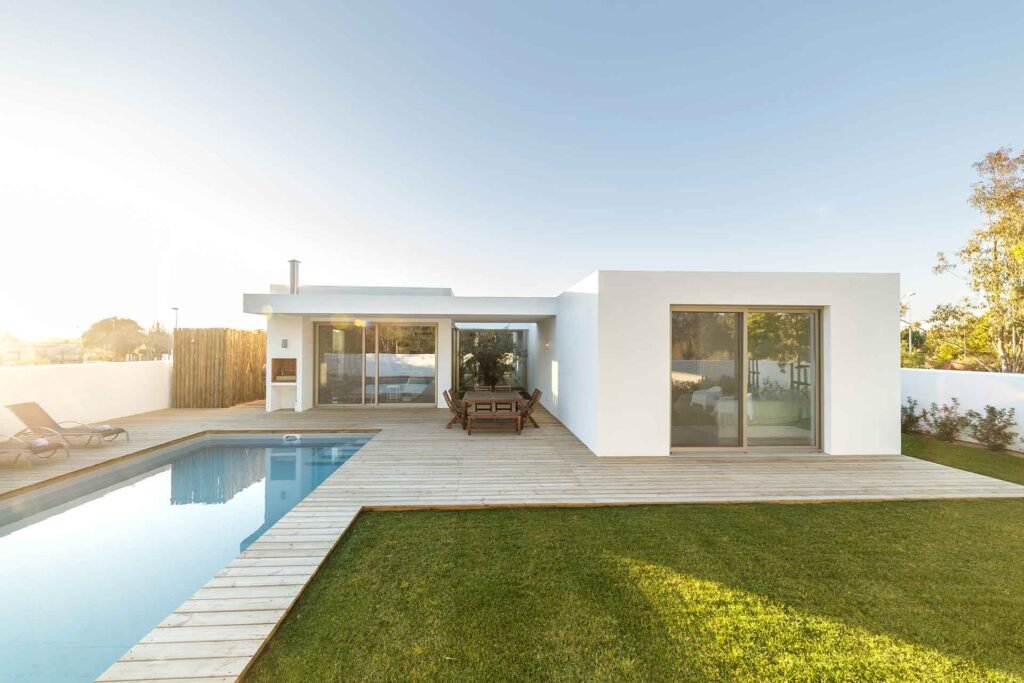 modern-house-with-garden-swimming-pool-and-wooden-PXH34K3.jpg