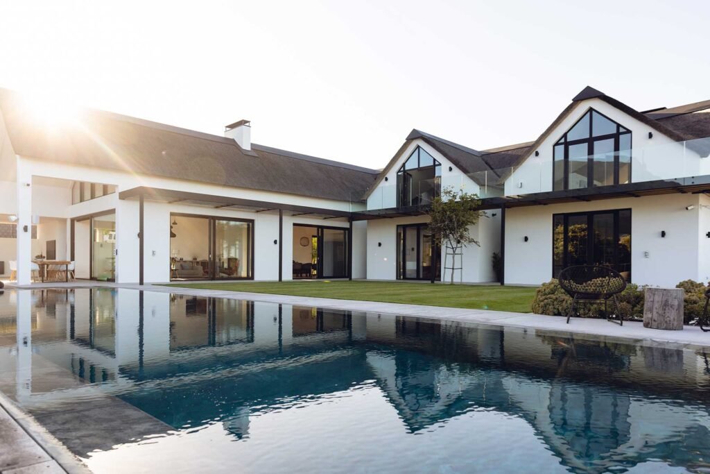view-of-luxurious-modern-house-exterior-with-garde-N8XVJEP.jpg